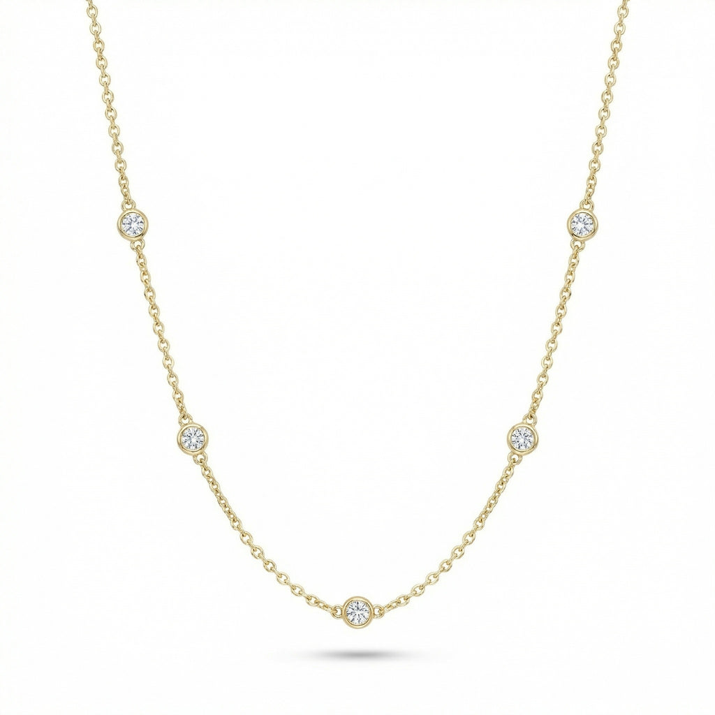 14K necklace with 5 bezel set diamonds