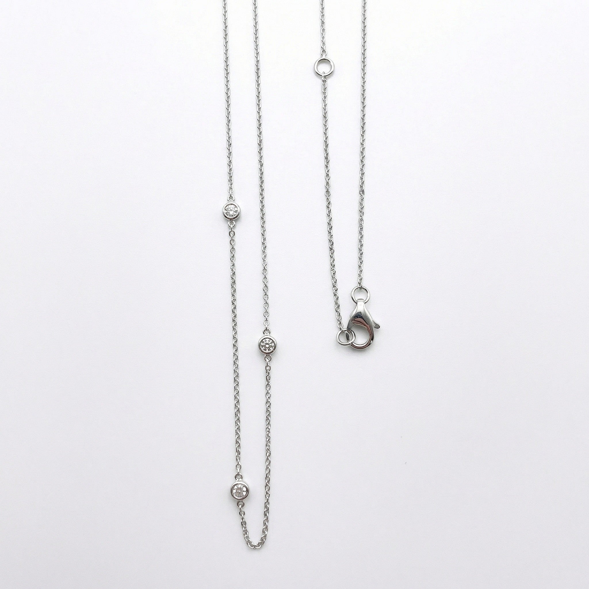 14K white gold necklace with bezel set diamonds