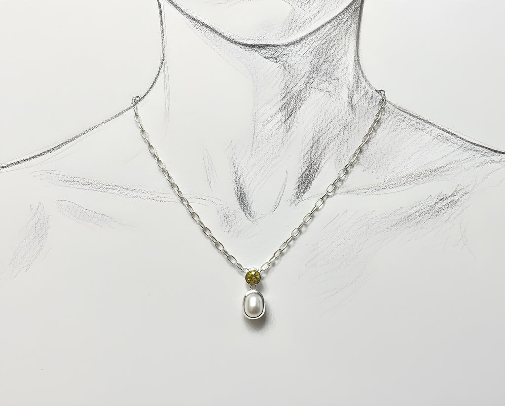 illustration display of sterling silver pendant with facetted citrine and cultured pearl