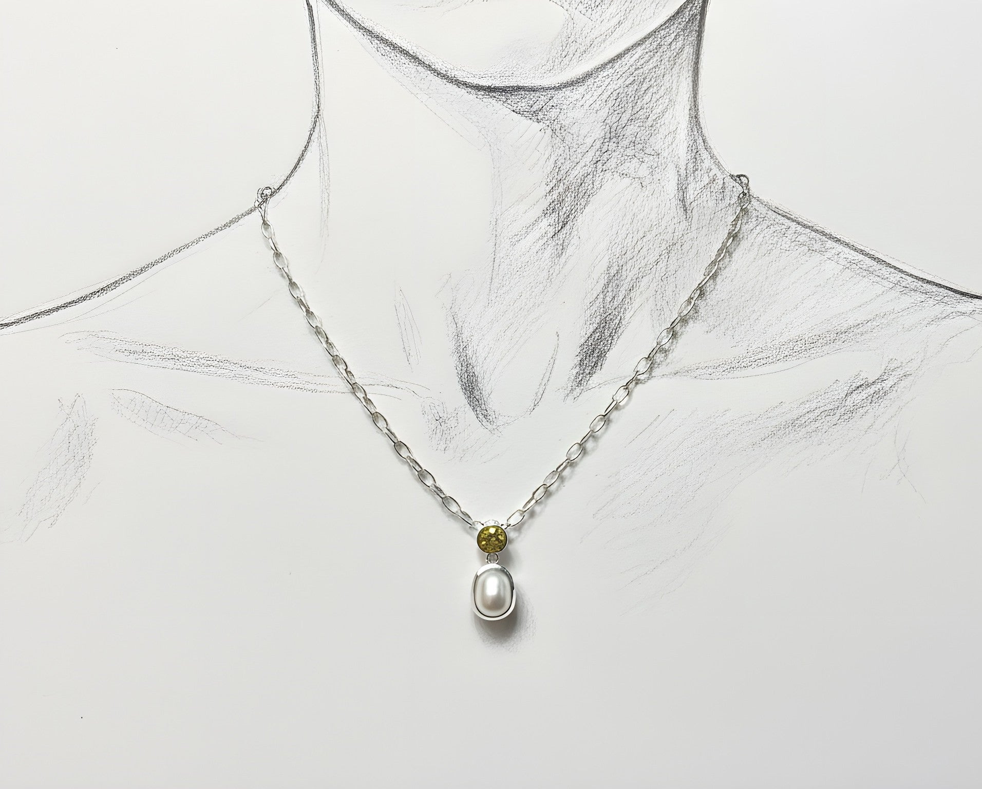 illustration display of sterling silver pendant with facetted citrine and cultured pearl