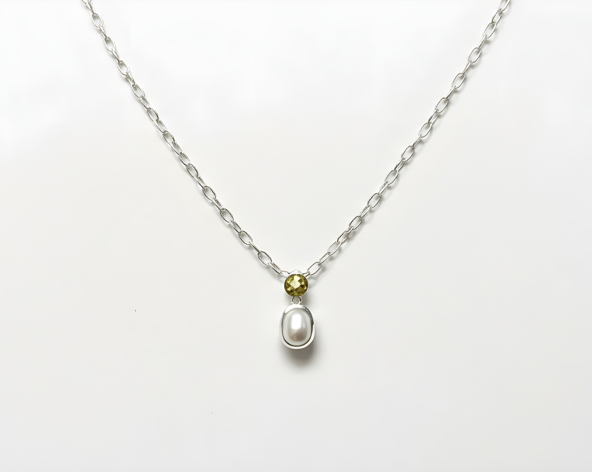 Drop earring with round citrine and cultured pearl